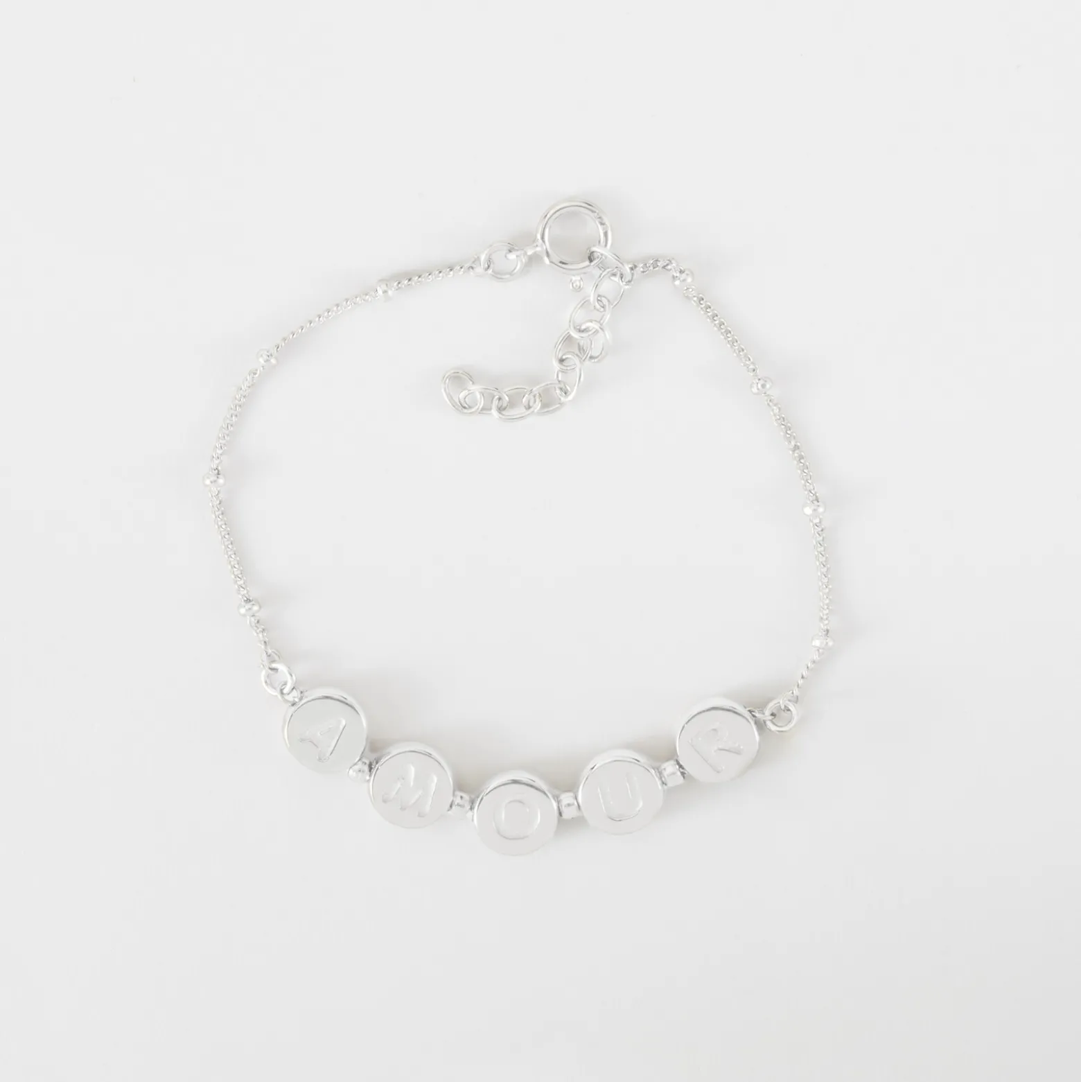 Bracelet chaîne pastilles estampillées "Amour" argent