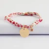Bracelet enfant Liberty personnalisé médaille gravée plaqué or 15 mm et breloque fleur zircon plaqué or 8 mm