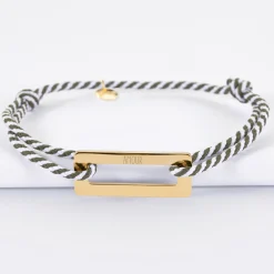 Bracelet homme personnalisé cordon tressé médaille gravée acier doré rectangle évidé 32x14 mm