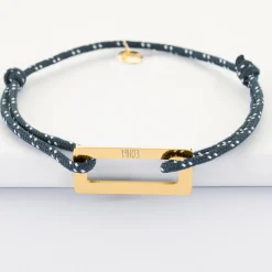 Bracelet homme personnalisé cordage marin simple médaille gravée acier doré rectangle évidé 32x14 mm
