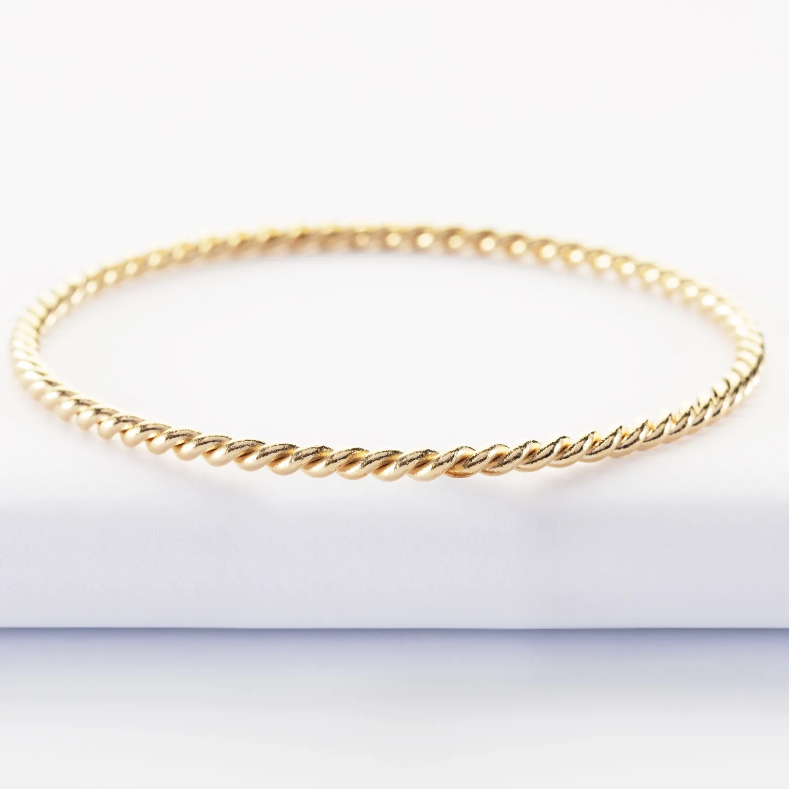 Bracelet jonc torsadé plaqué or