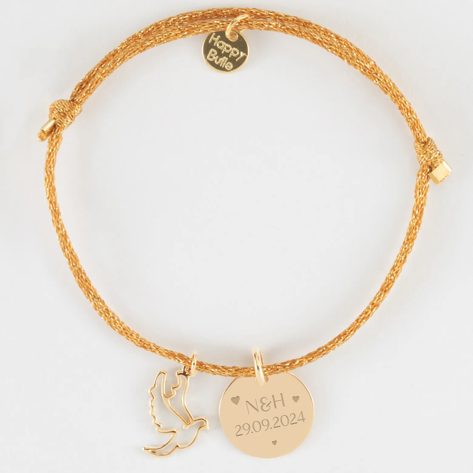 Bracelet personnalisé cordon pailleté médaille gravée plaqué or 15 mm et breloque colombe 18 mm