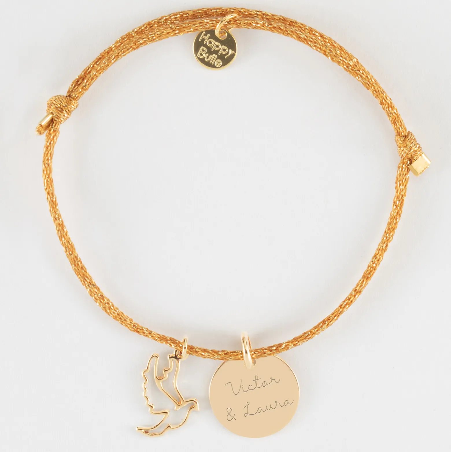 Bracelet personnalisé cordon pailleté médaille gravée plaqué or 15 mm et breloque colombe 18 mm