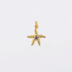 Breloque étoile de mer scintillante zircons bleus plaqué or 15 mm