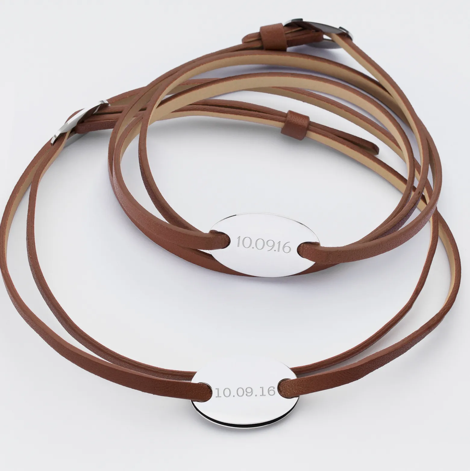 Duo de bracelets cuir personnalisés médailles gravées argent ovales 2 trous 25x16 mm
