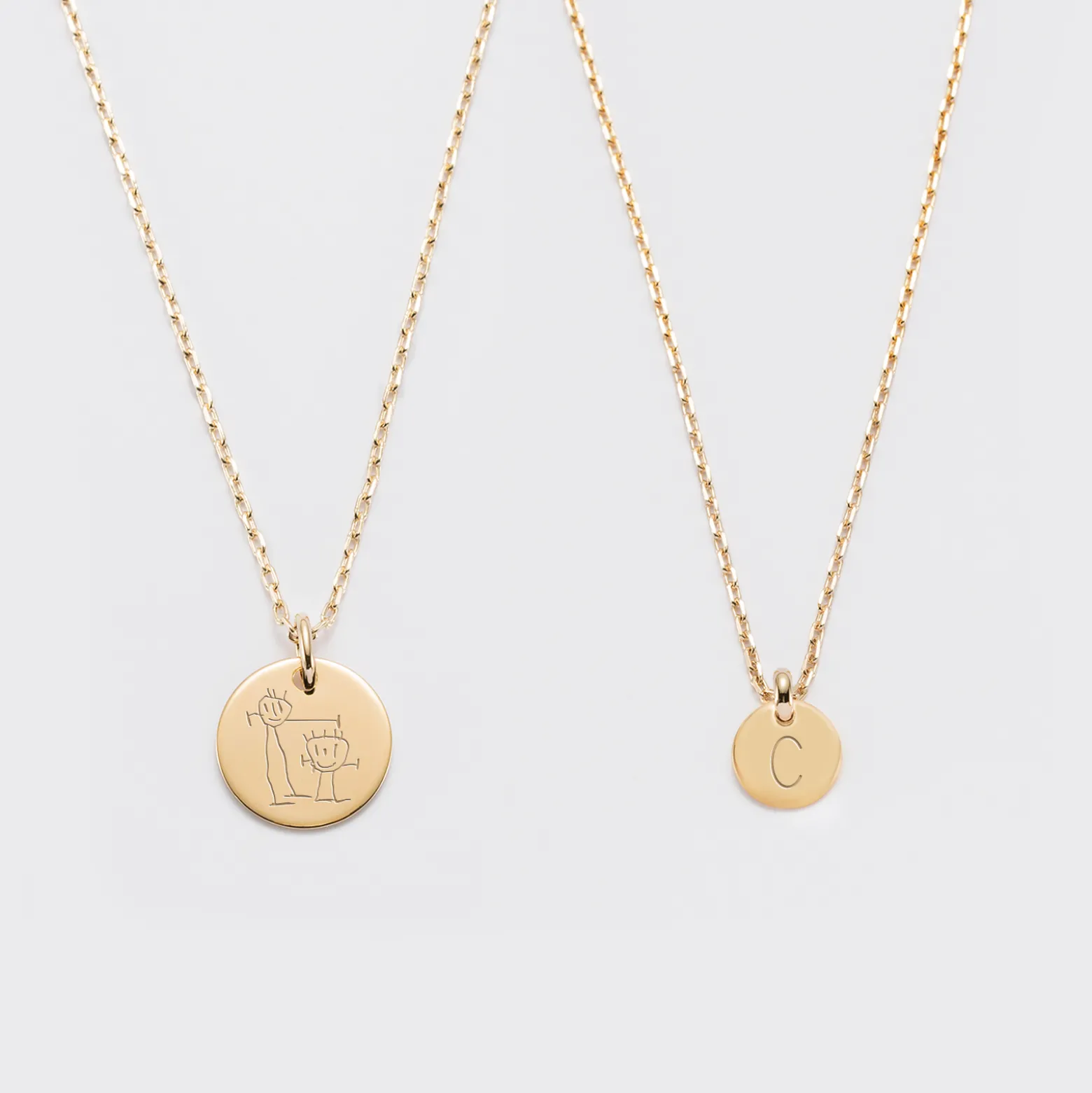 Duo de pendentifs personnalisés médailles gravées plaqué or 15 mm et 10 mm