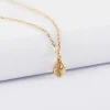 Pendentif enfant coquillage cauri plaqué or 10 mm