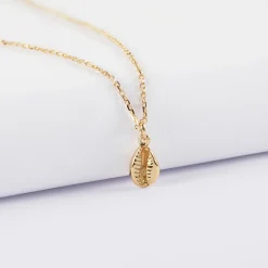 Pendentif enfant coquillage cauri plaqué or 10 mm