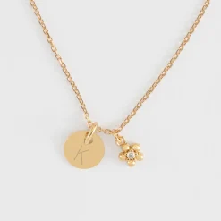 Pendentif enfant personnalisé médaille gravée plaqué or 10 mm et breloque fleur zircon plaqué or 8 mm