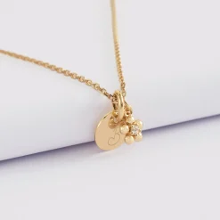 Pendentif enfant personnalisé médaille gravée plaqué or 10 mm et breloque fleur zircon plaqué or 8 mm