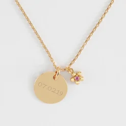Pendentif enfant personnalisé médaille gravée plaqué or 15 mm et breloque fleur zircon plaqué or 8 mm