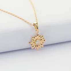 Pendentif marguerite scintillante plaqué or 13 mm