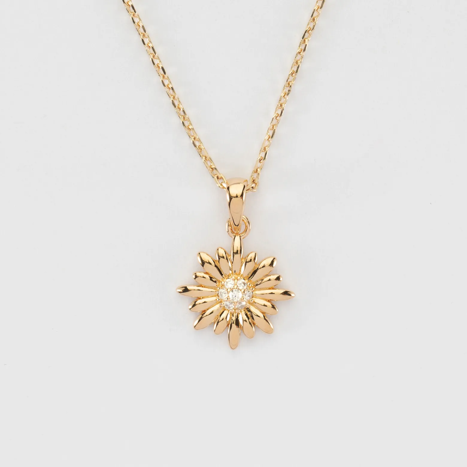 Pendentif marguerite scintillante plaqué or 13 mm