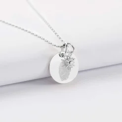 Pendentif personnalisé médaille gravée argent 15 mm et breloque étoile brillante 6 mm