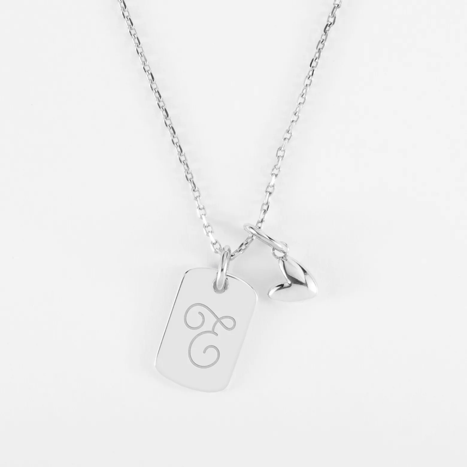 Pendentif personnalisé médaille gravée argent rectangle 17x11 mm et breloque petit coeur bombé 7 mm - HappyBulle x Atelier Wagram