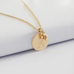 Pendentif personnalisé médaille gravée plaqué or 15 mm et breloque fleur zircon plaqué or 8 mm