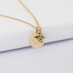 Pendentif personnalisé médaille gravée plaqué or 15 mm et breloque fleur pétales zircons 10 mm