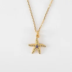 Pendentif étoile de mer scintillante zircons bleus plaqué or 15 mm