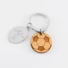 Porte clé personnalisé médaille gravée ovale acier et breloque bois foot