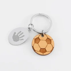 Porte clé personnalisé médaille gravée ovale acier et breloque bois foot