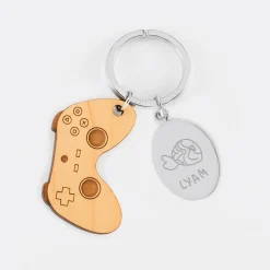 Porte clé personnalisé médaille gravée ovale acier et breloque bois jeux vidéo