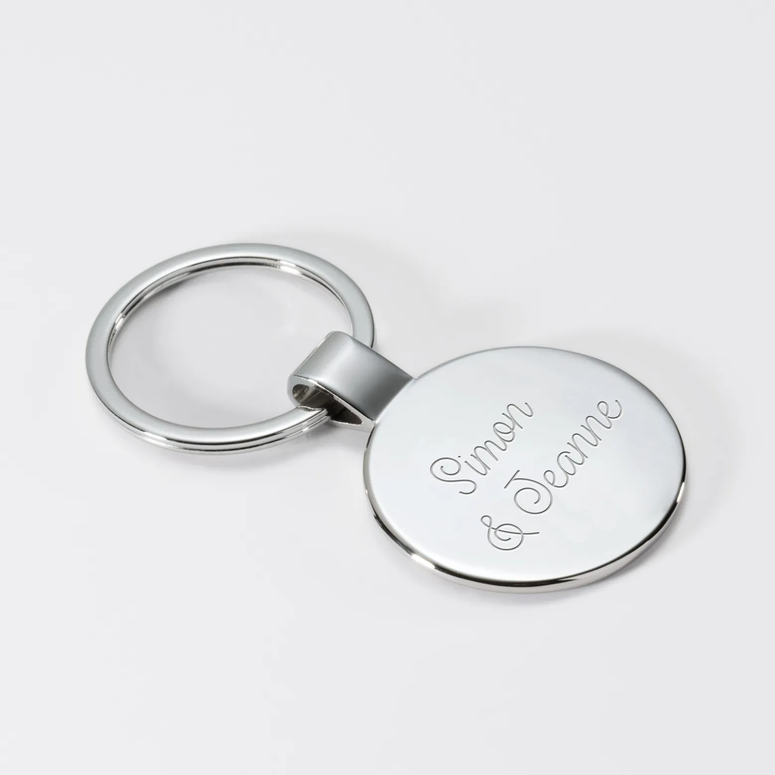 Porte-clés EVG personnalisé gravé acier rond 37 mm