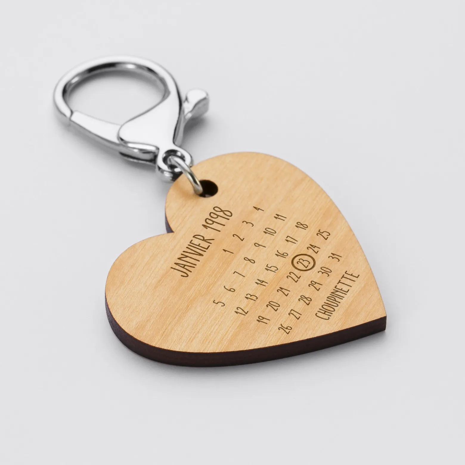 Porte-clés personnalisé calendrier médaille gravée bois