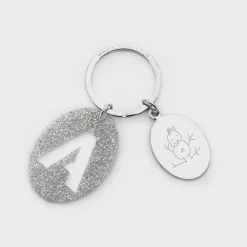 Porte-clés personnalisé médaille gravée ovale acier et breloque initiale acrylique pailleté argenté